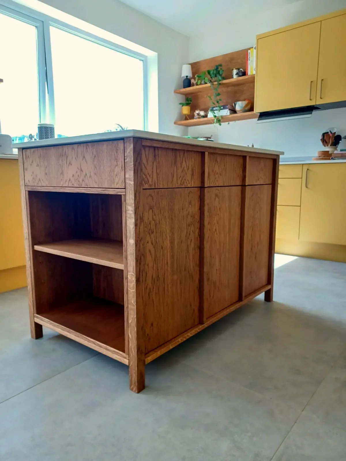Bespoke oak kitchen island with open shelves and panelled cupboard doors, in Batheaston