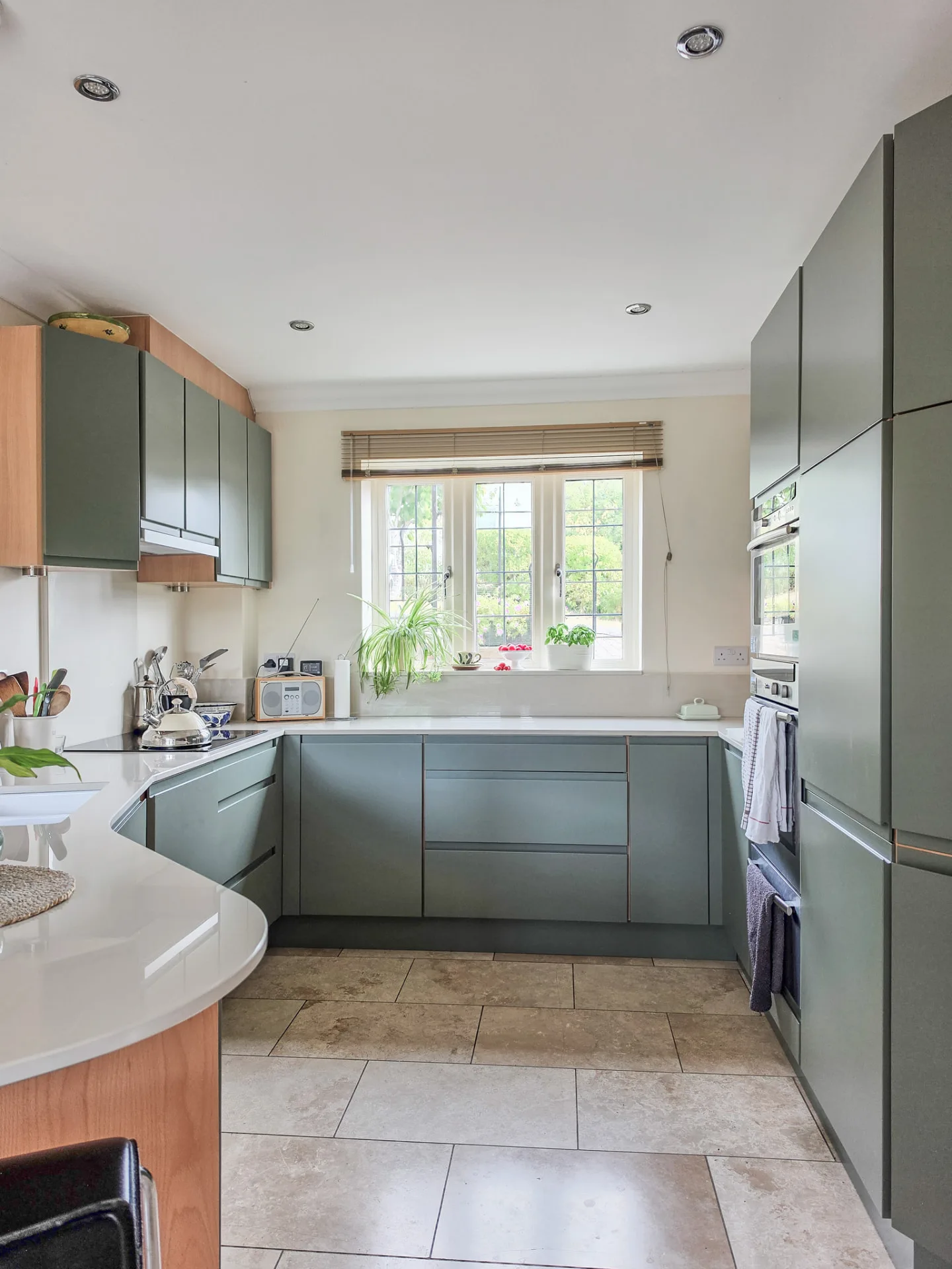 Refreshed Wiltshire kitchen with new sprayed doors, handles and worktops