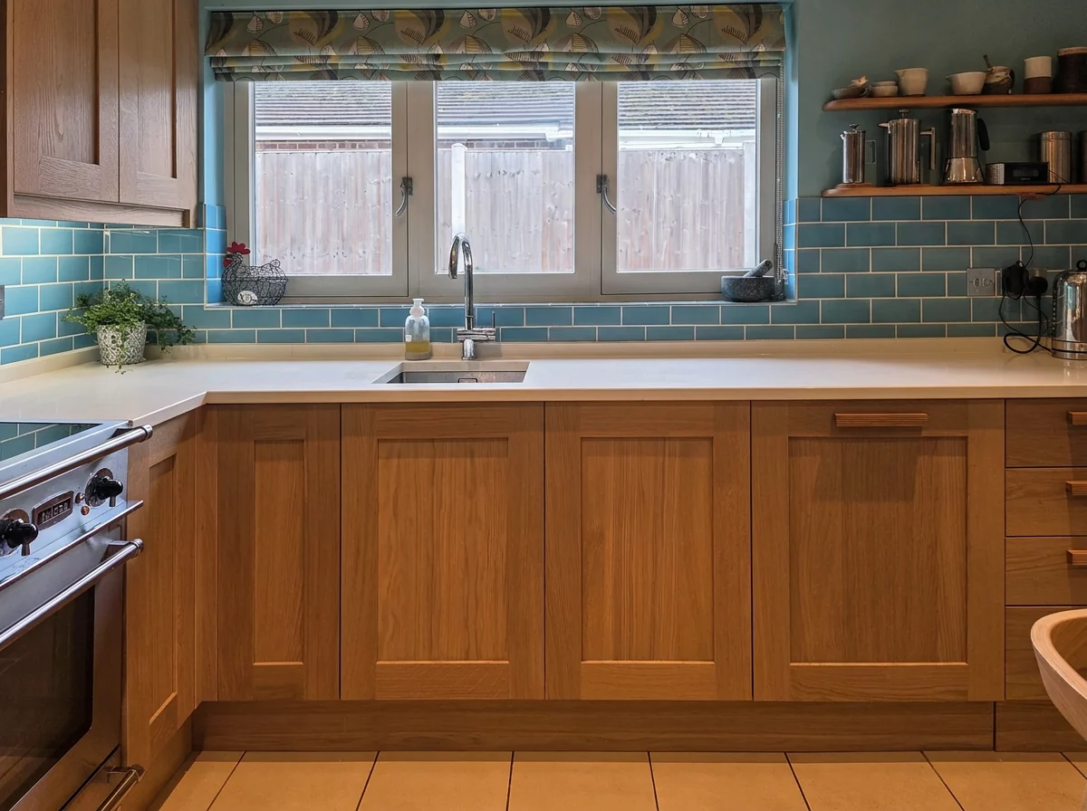 New solid oak Shaker replacement doors and a white quartz worktop on the existing cabinets, in Devizes