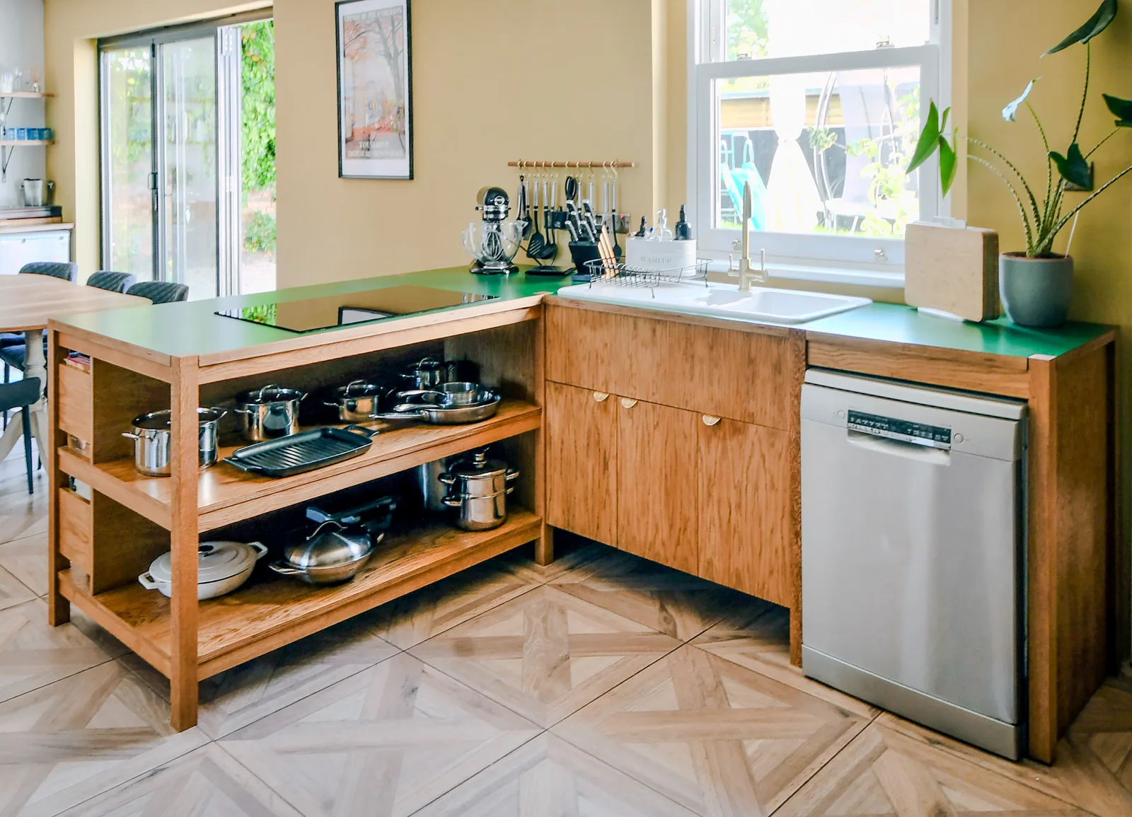 Freestanding bespoke solid oak kitchen with open shelving, cupboards, sink and dishwasher, handmade in the workshop for a Melksham home