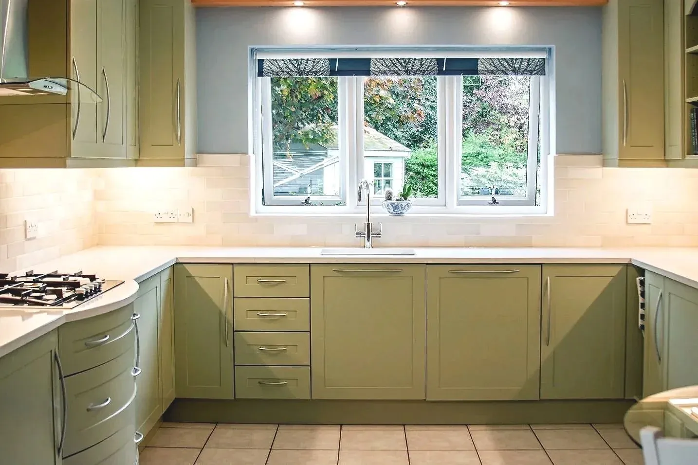 The new scheme blends with the existing flooring and tiles