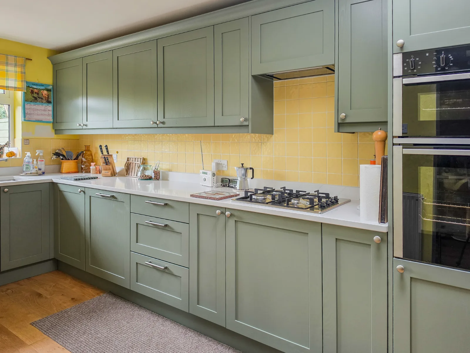 Shaker kitchen doors in a Corsham property, painted in a calm green, installed by Nick Archibold