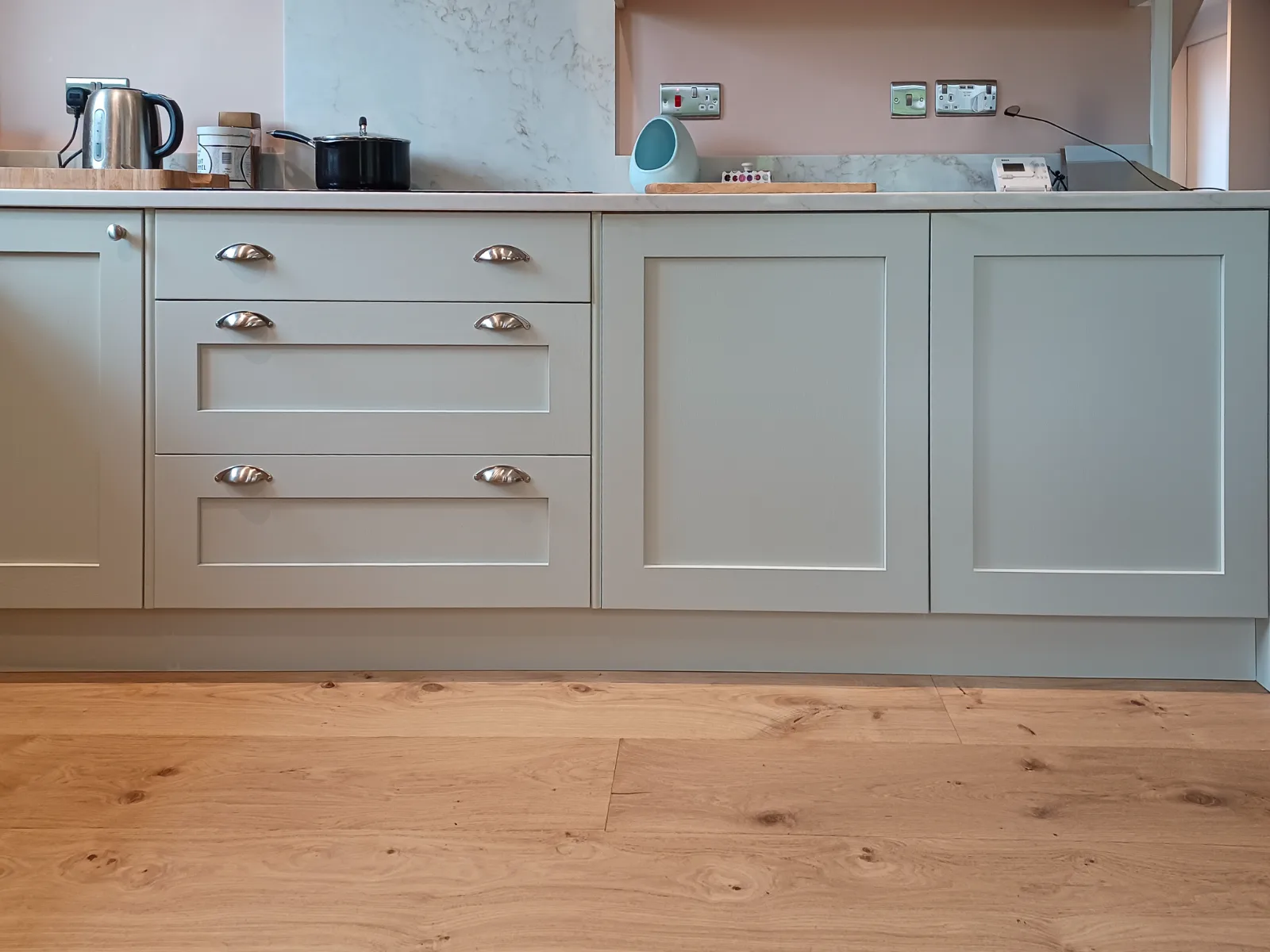 Simple lines and D-cup pulls suit this period property.