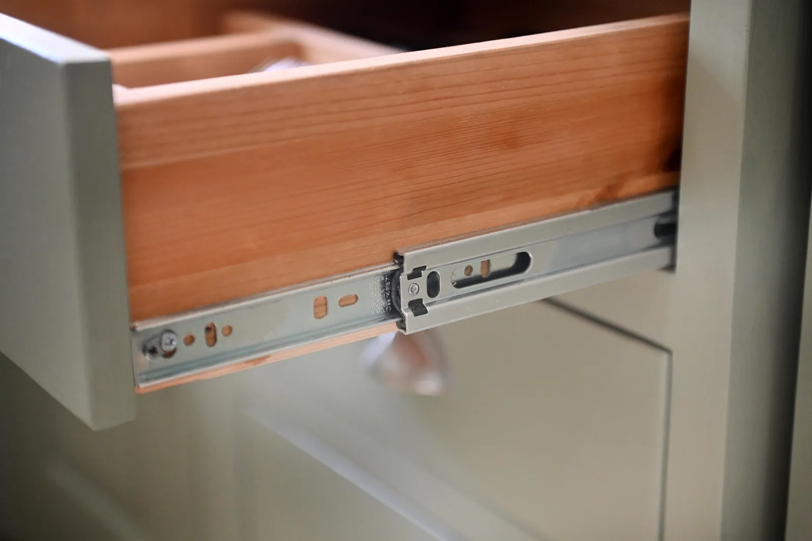 A solid wood drawer box with upgraded runners