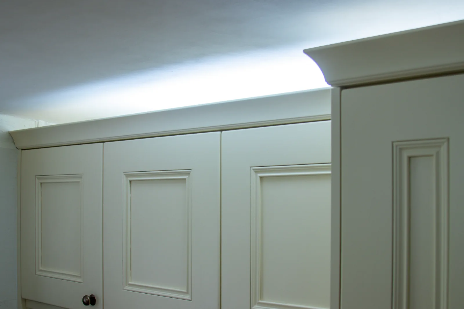 New over-cabinet lighting washes across the ceiling