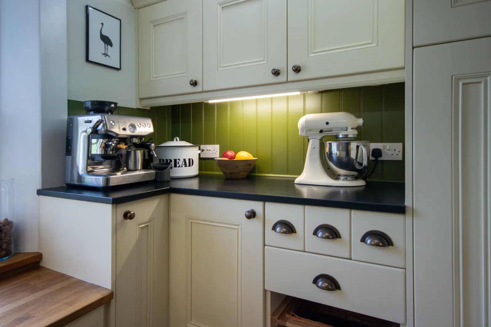 The green splashback pops with colour