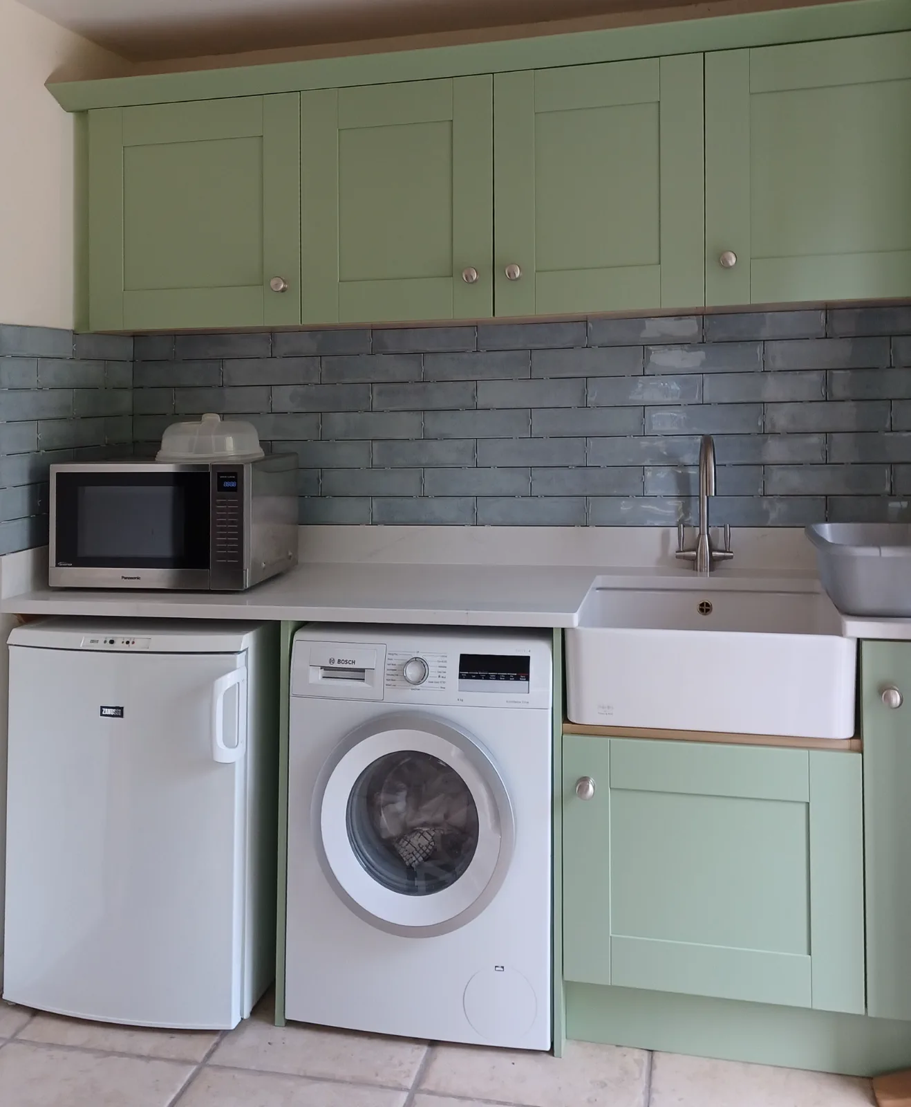 Matching refreshed utility room.